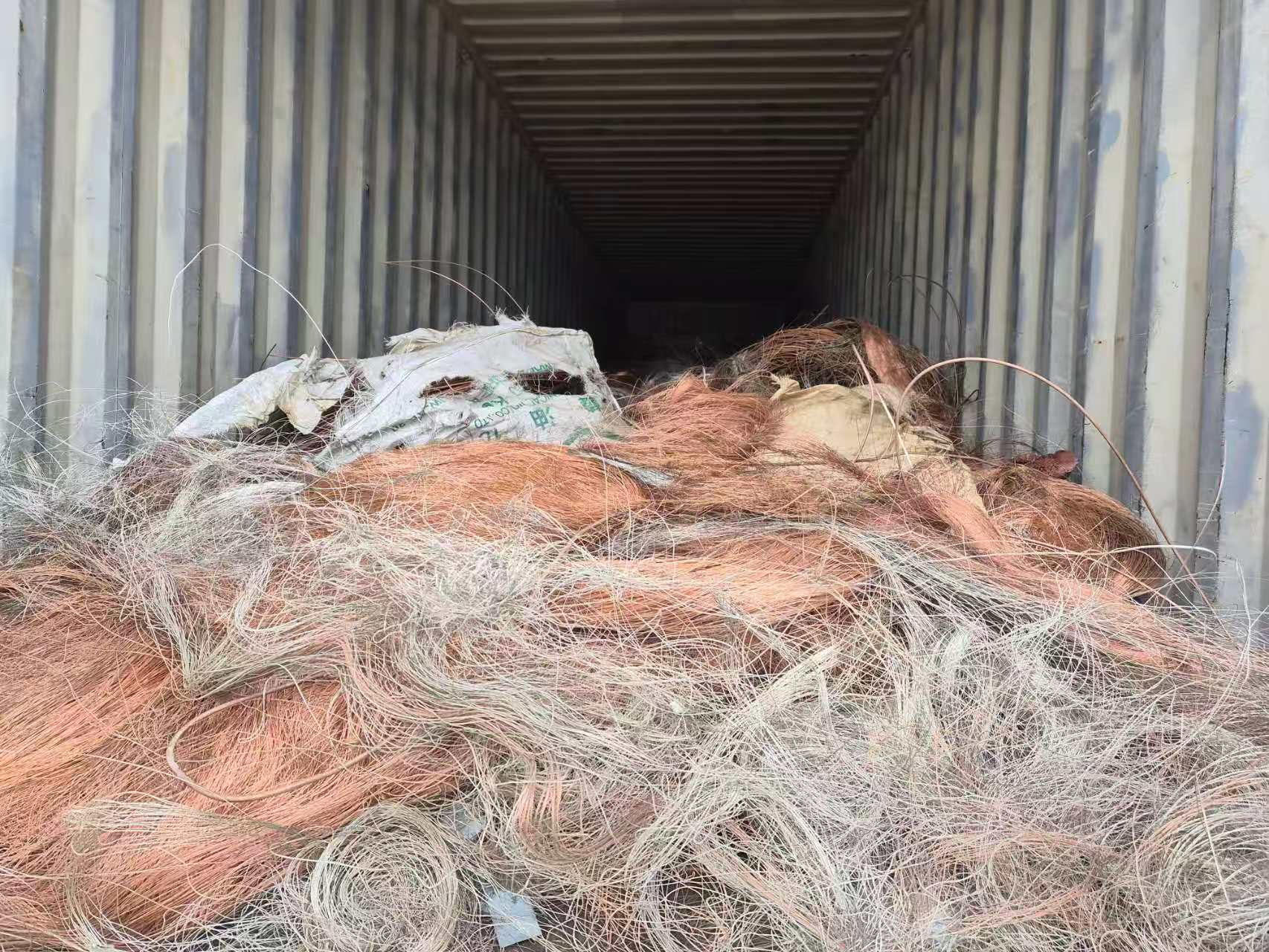 Tinned copper and copper wire scrap in container